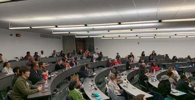 Lecture hall full of people.