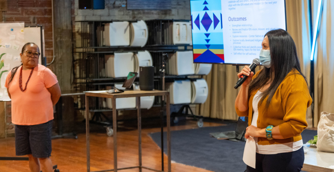 Speakers speaking to crowd