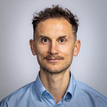 Professional headshot of Evan Long, CPO