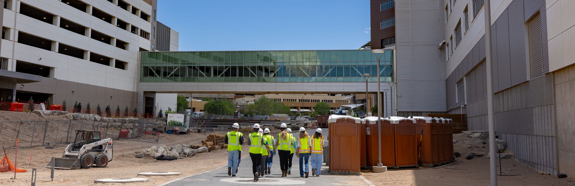 Construction workers in front of UNMH CCT.