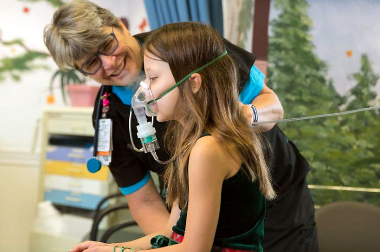 child using nebulizer