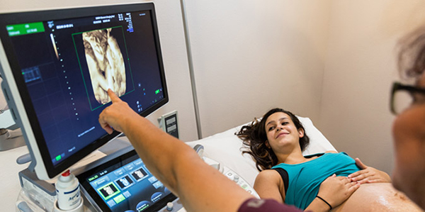 A pregnant woman getting an ultrasound