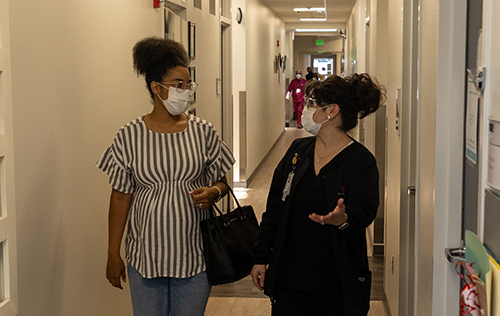 A patient talking to a prenatal provider