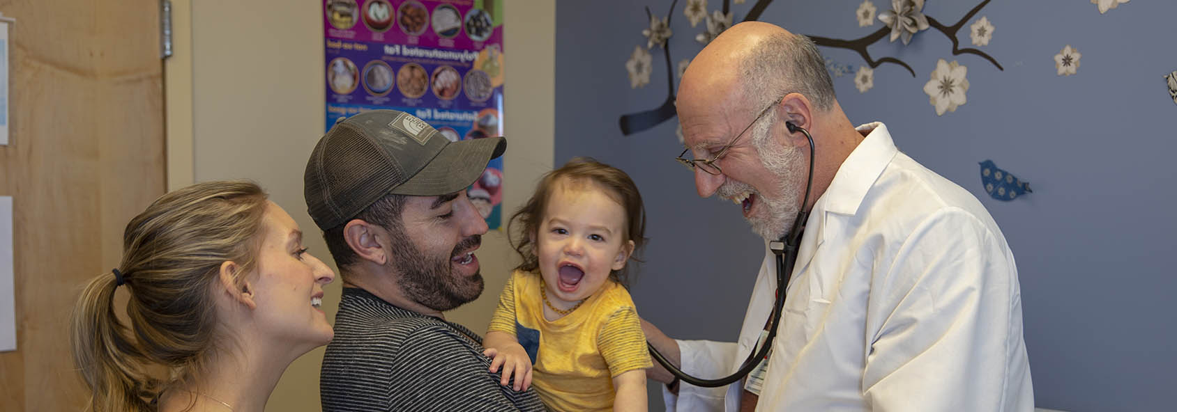 A doctor talking to a family