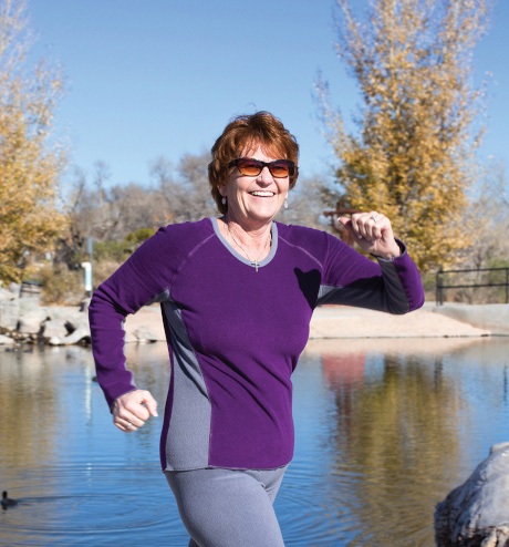 Woman smiling and walking.